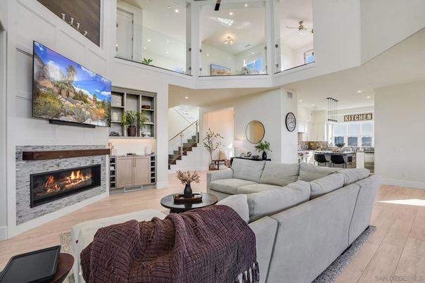 Dining room, Fireplace, Interior, Living room, Pendant Lights, Recessed Lighting, Wood Texture Flooring