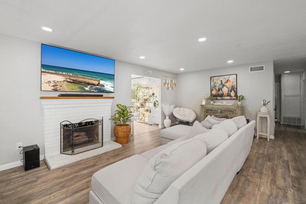 Fireplace, Interior, Living room, Recessed Lighting, Wood Texture Flooring
