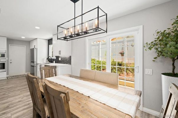 Dining room, Interior, Kitchen, Pendant Lights, Recessed Lighting, Stainless Steel Appliances, Wood Texture Flooring