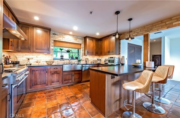 Interior, Kitchen, Pendant Lights, Recessed Lighting, Stainless Steel Appliances, Stone Walls