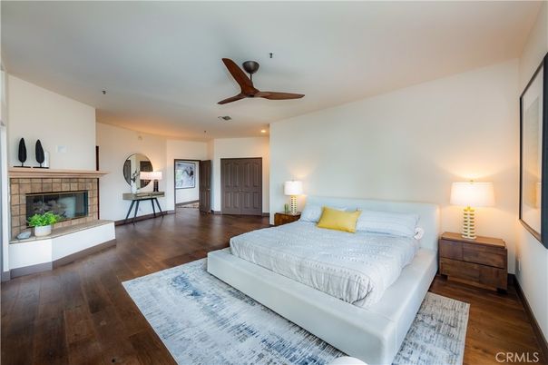 Bedroom, Fireplace, Interior, Recessed Lighting, Wood Texture Flooring