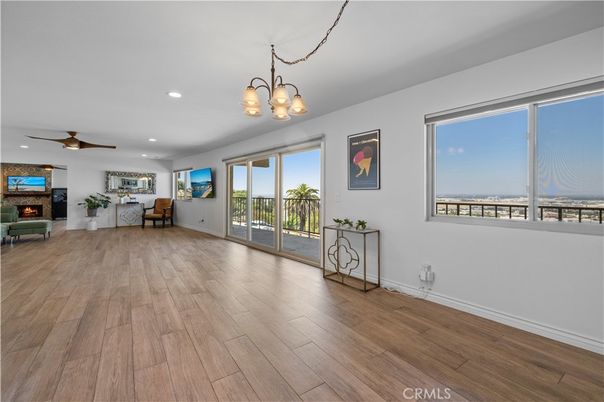Chandelier, Fireplace, Interior, Recessed Lighting, Wood Texture Flooring