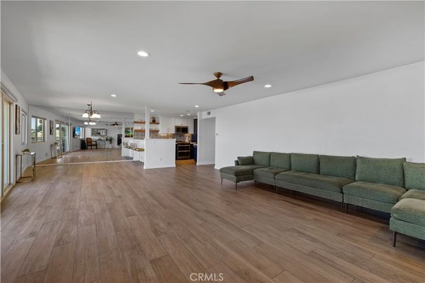 Chandelier, Dining room, Interior, Kitchen, Living room, Pendant Lights, Recessed Lighting, Wood Texture Flooring