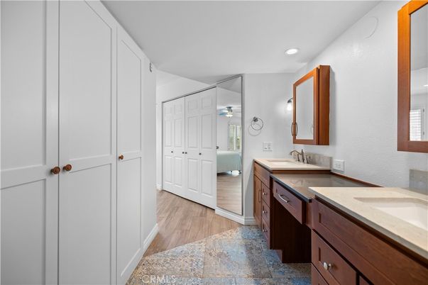 Bathroom, Dual Sink Vanities, Interior, Recessed Lighting, Wood Texture Flooring
