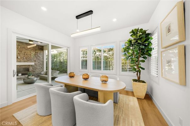 Dining room, Fireplace, Interior, Pendant Lights, Recessed Lighting, Stone Walls, Wood Texture Flooring