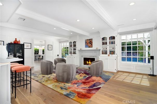 Dining room, Fireplace, Interior, Living room, Recessed Lighting, Wood Texture Flooring
