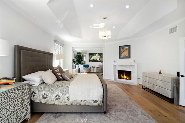 Bedroom, Fireplace, Interior, Pendant Lights, Recessed Lighting, Wood Texture Flooring