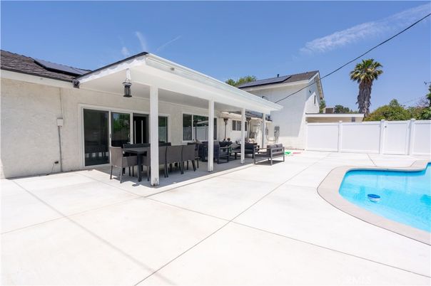 Exterior, Pool, Solar Panels