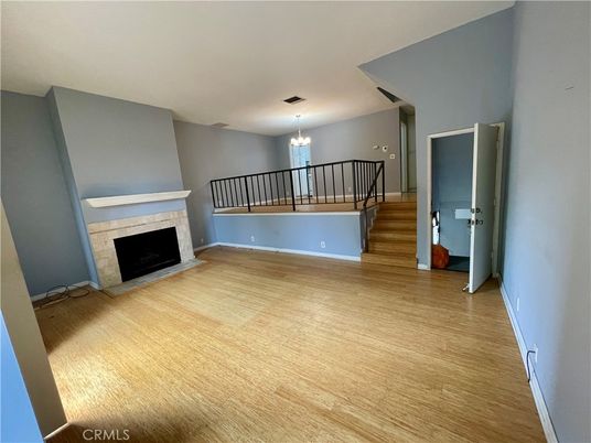 Chandelier, Empty room, Fireplace, Interior, Wood Texture Flooring