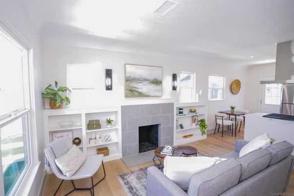 Dining room, Fireplace, Interior, Kitchen, Living room, Recessed Lighting, Wood Texture Flooring
