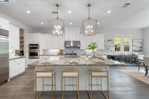 Dining room, Interior, Kitchen, Pendant Lights, Recessed Lighting, Stainless Steel Appliances, Wood Texture Flooring