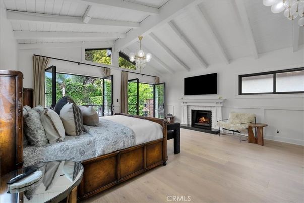 Bedroom, Chandelier, Fireplace, Interior, Wood Texture Flooring