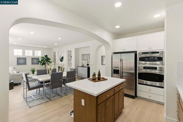Dining room, Interior, Kitchen, Living room, Recessed Lighting, Stainless Steel Appliances, Wood Texture Flooring