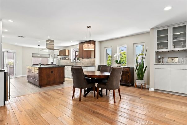 Dining room, Interior, Kitchen, Pendant Lights, Recessed Lighting, Stainless Steel Appliances, Wood Texture Flooring