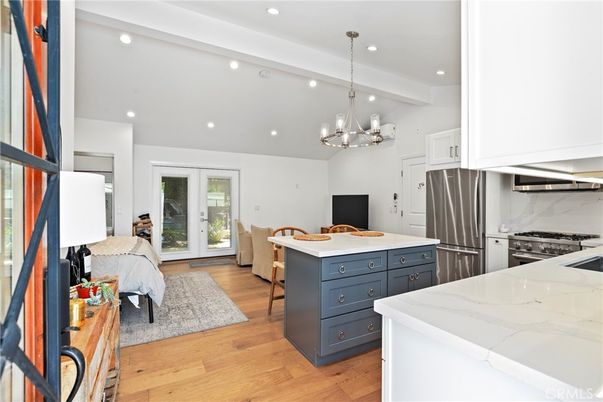 Bedroom, Chandelier, Interior, Kitchen, Recessed Lighting, Stainless Steel Appliances, Wood Texture Flooring
