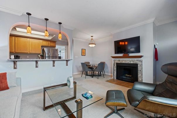 Dining room, Fireplace, Interior, Kitchen, Living room, Pendant Lights, Stainless Steel Appliances