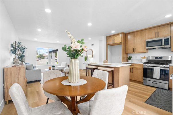 Dining room, Interior, Kitchen, Living room, Recessed Lighting, Stainless Steel Appliances, Wood Texture Flooring