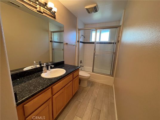 Bathroom, Dual Sink Vanities, Glass Shower, Interior, Wood Texture Flooring