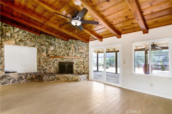 Empty room, Fireplace, Interior, Stone Walls, Wooden Beams, Wooden Ceilings, Wood Texture Flooring