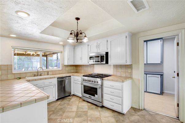 Interior, Kitchen, Pendant Lights, Recessed Lighting, Stainless Steel Appliances, Tile Countertops