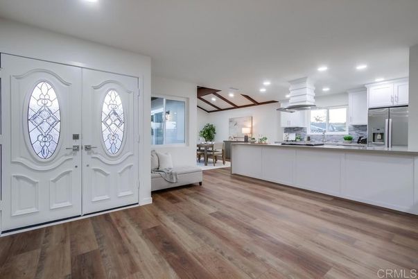 Dining room, Interior, Kitchen, Living room, Recessed Lighting, Stainless Steel Appliances, Wood Texture Flooring