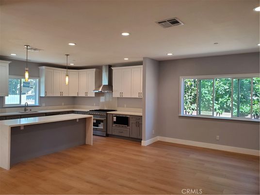 Interior, Kitchen, Pendant Lights, Recessed Lighting, Stainless Steel Appliances, Wood Texture Flooring