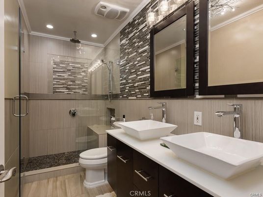 Bathroom, Dual Sink Vanities, Glass Shower, Interior, Recessed Lighting, Wood Texture Flooring