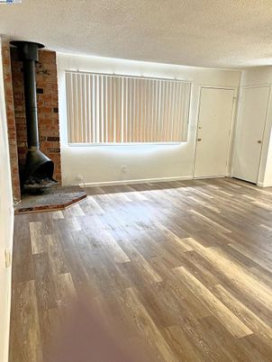 Empty room, Fireplace, Interior, Stone Walls, Wood Texture Flooring