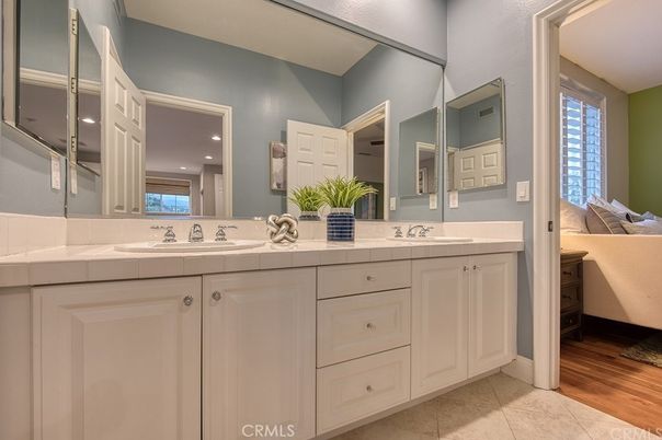 Bathroom, Dual Sink Vanities, Interior, Recessed Lighting, Tile Countertops, Wood Texture Flooring