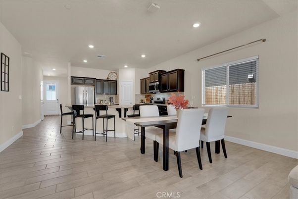 Dining room, Interior, Kitchen, Recessed Lighting, Stainless Steel Appliances, Wood Texture Flooring