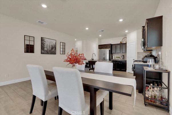 Dining room, Interior, Kitchen, Recessed Lighting, Stainless Steel Appliances, Wood Texture Flooring
