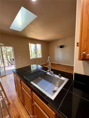Interior, Kitchen, Tile Countertops, Wood Texture Flooring