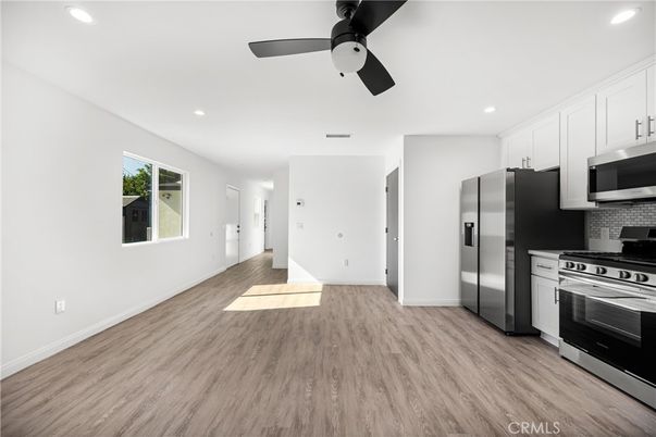 Interior, Kitchen, Recessed Lighting, Stainless Steel Appliances, Wood Texture Flooring