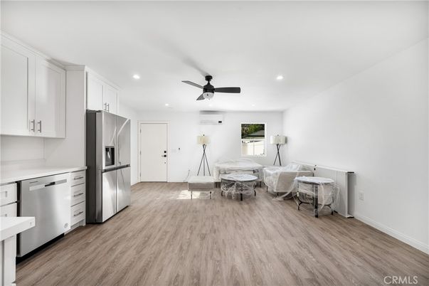 Dining room, Interior, Kitchen, Recessed Lighting, Stainless Steel Appliances, Wood Texture Flooring