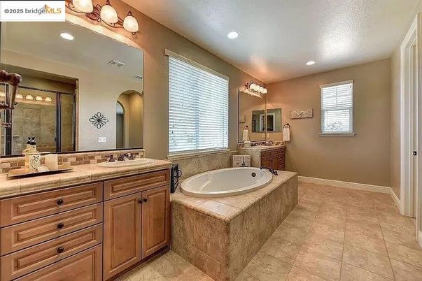 Bathroom, Dual Sink Vanities, Interior, Recessed Lighting, Tile Countertops