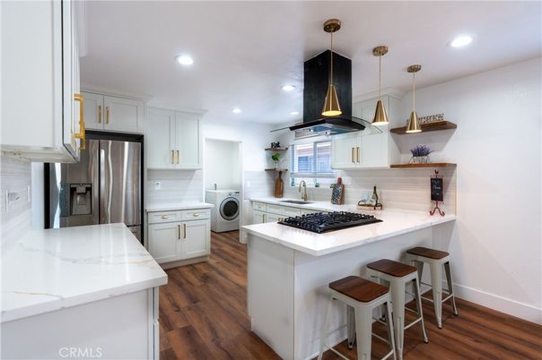 Interior, Kitchen, Pendant Lights, Recessed Lighting, Stainless Steel Appliances, Washer, Wood Texture Flooring