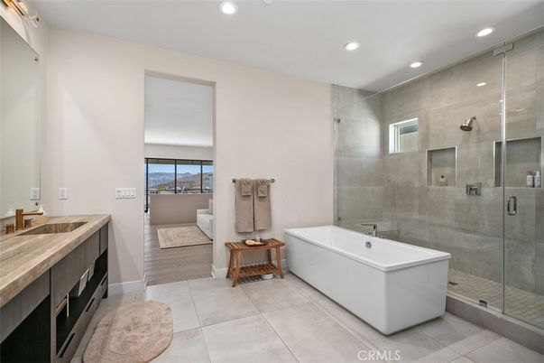 Bathroom, Free Standing Baths, Glass Shower, Interior, Recessed Lighting, Wood Texture Flooring