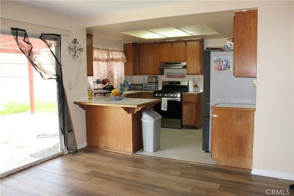 Interior, Kitchen, Tile Countertops, Wood Texture Flooring