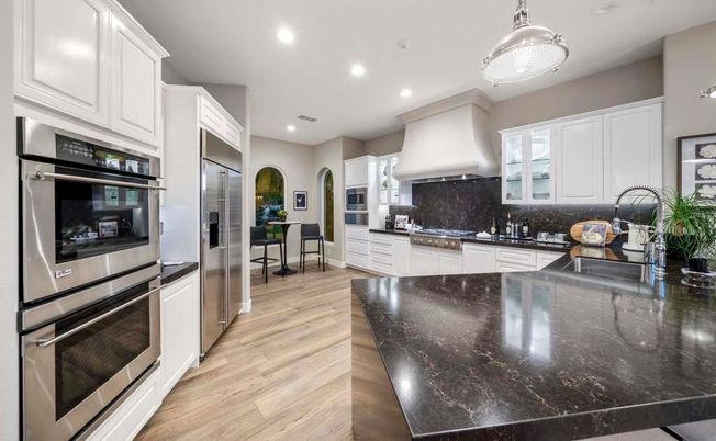 Dining room, Interior, Kitchen, Recessed Lighting, Stainless Steel Appliances, Wood Texture Flooring