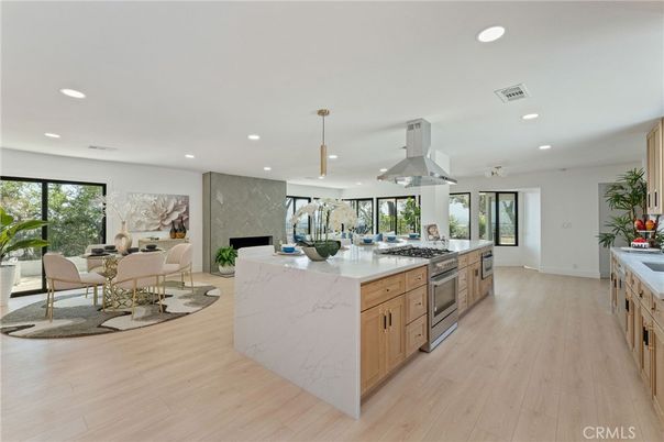 Dining room, Interior, Kitchen, Pendant Lights, Recessed Lighting, Stainless Steel Appliances, Wood Texture Flooring