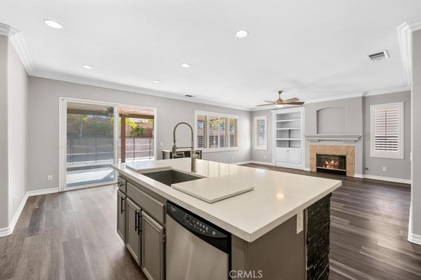 Fireplace, Interior, Kitchen, Recessed Lighting, Wood Texture Flooring