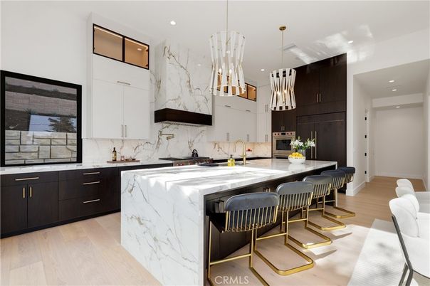 Interior, Kitchen, Marble Walls, Pendant Lights, Recessed Lighting, Stainless Steel Appliances, Wood Texture Flooring
