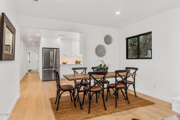 Dining room, Interior, Kitchen, Recessed Lighting, Stainless Steel Appliances, Wood Texture Flooring