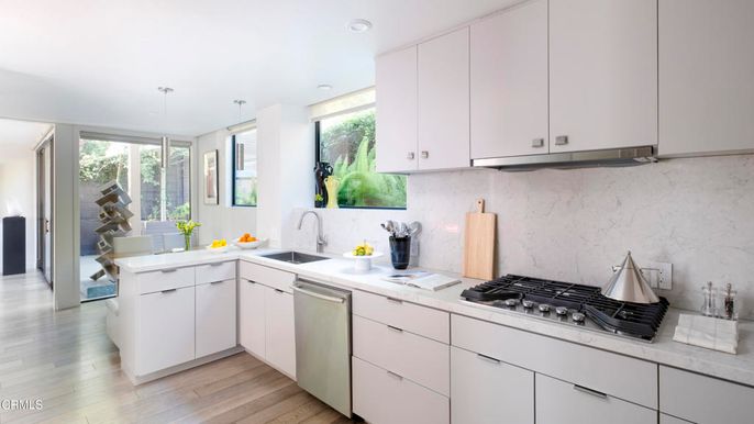 Interior, Kitchen, Marble Walls, Pendant Lights, Recessed Lighting, Stainless Steel Appliances, Wood Texture Flooring