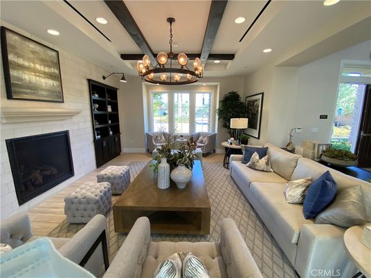 Chandelier, Dining room, Fireplace, Interior, Living room, Recessed Lighting, Stone Walls, Wooden Beams, Wood Texture Flooring