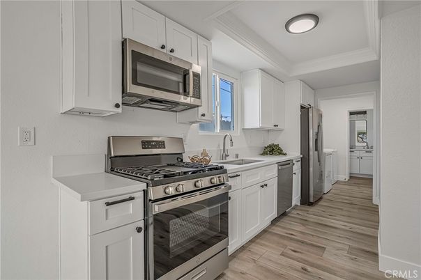 Interior, Kitchen, Recessed Lighting, Stainless Steel Appliances, Wood Texture Flooring
