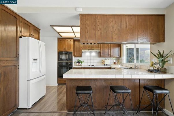 Interior, Kitchen, Tile Countertops, Wood Texture Flooring