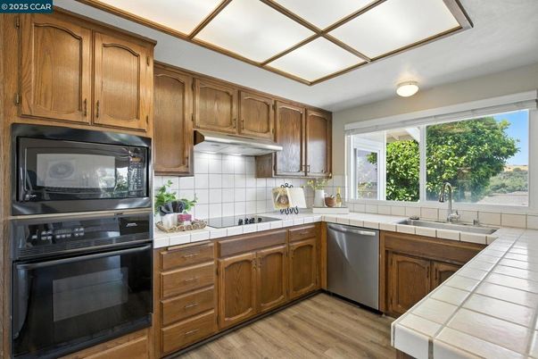 Interior, Kitchen, Tile Countertops, Wood Texture Flooring