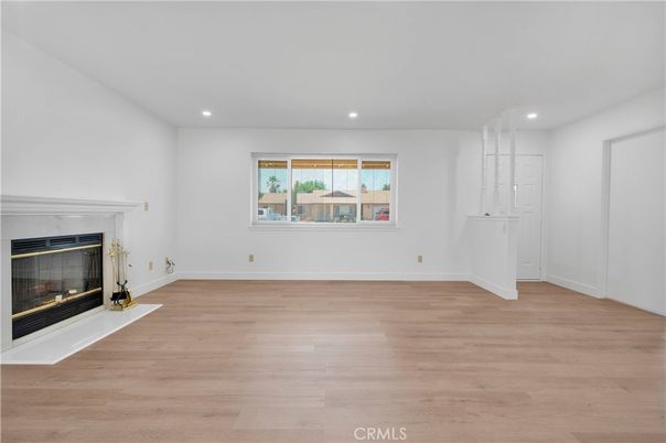 Empty room, Fireplace, Interior, Recessed Lighting, Wood Texture Flooring