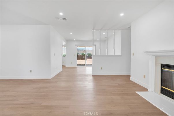 Empty room, Fireplace, Interior, Recessed Lighting, Wood Texture Flooring